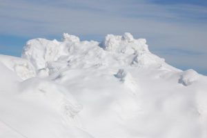 huge pile of shoveled snow