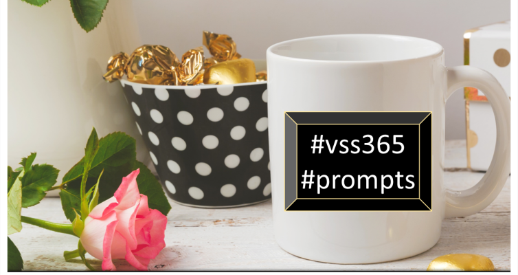gold wrapped chocolates, a pink rose, and a coffee cup with the words #vss365 #prompts