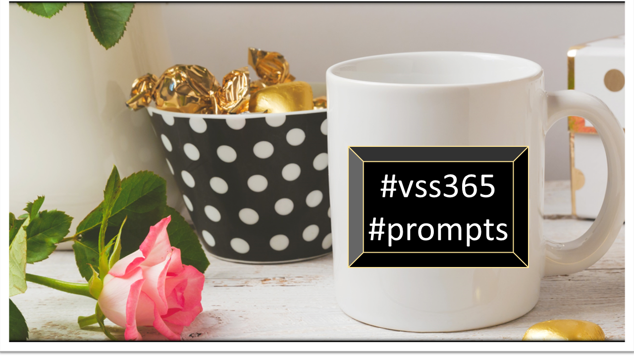 gold wrapped chocolates, a pink rose, and a coffee cup with the words #vss365 #prompts