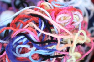 photo of colorful, tangled yarn by Vicki Becker #vss365 #prompts #tangle #Haiku